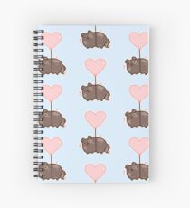 Cuaderno de espiral flotando a la nube 9