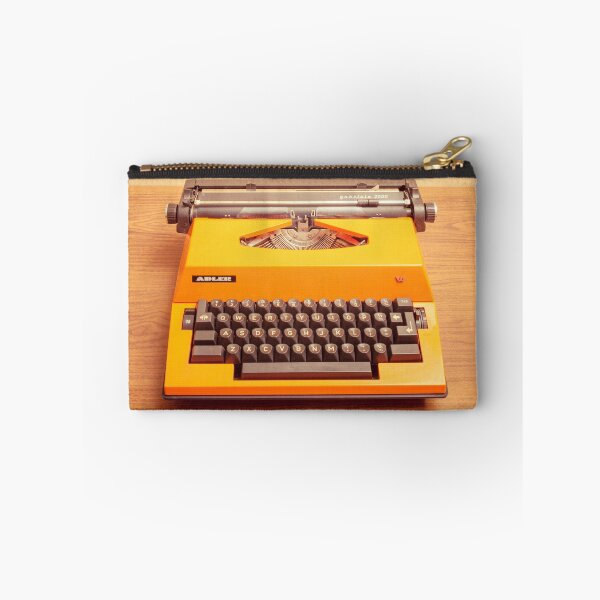 Item preview, Orange Portable Typewriter 04 designed and sold by Richard Nixon.