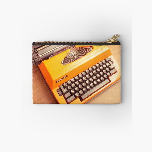 Item preview, Orange Portable Typewriter 05 designed and sold by Richard Nixon.