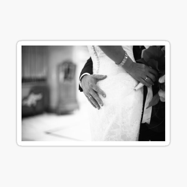 Groom holding bottom of bride black and white wedding photograph Sticker