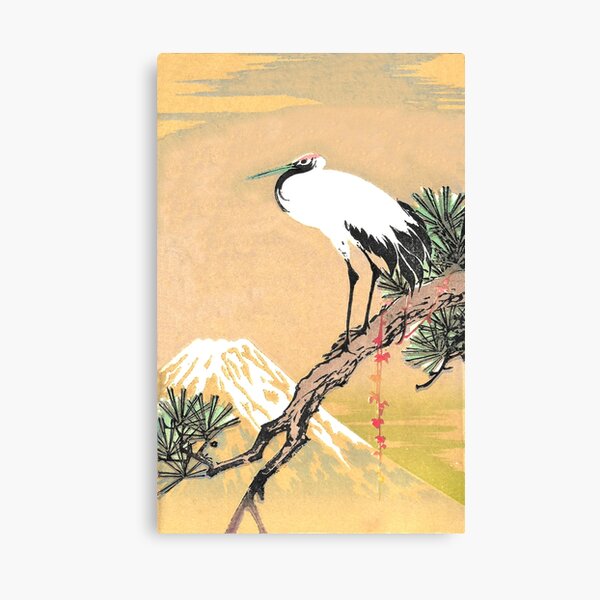 Stork standing on a Pine Tree limb in sight of a Snow covered Mountain Peak Canvas Print