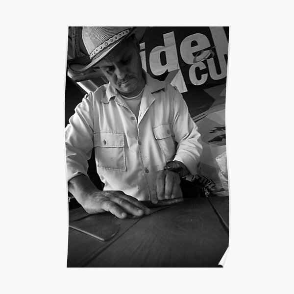 A ranchero rolls us a cigar Poster