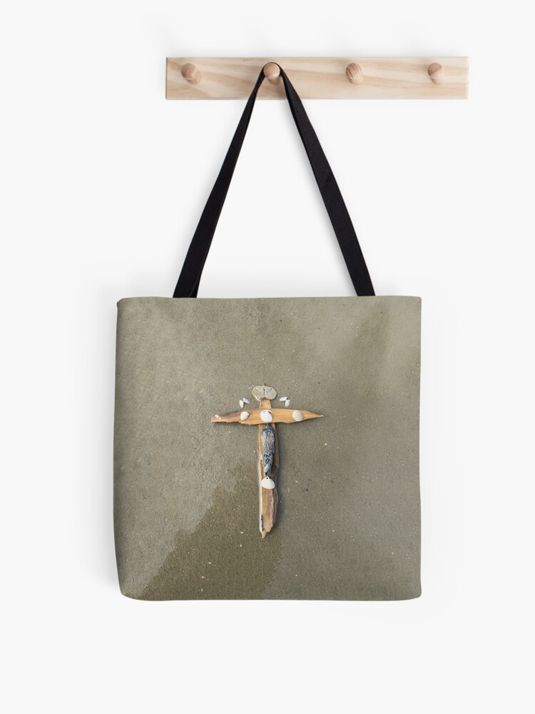 Thumbnail 1 of 2, Tote Bag, Driftwood cross on beach sand - From ccnow.info designed and sold by sdawsoncc.