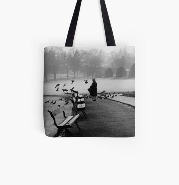 Shy woman feeding pigeons All Over Print Tote Bag