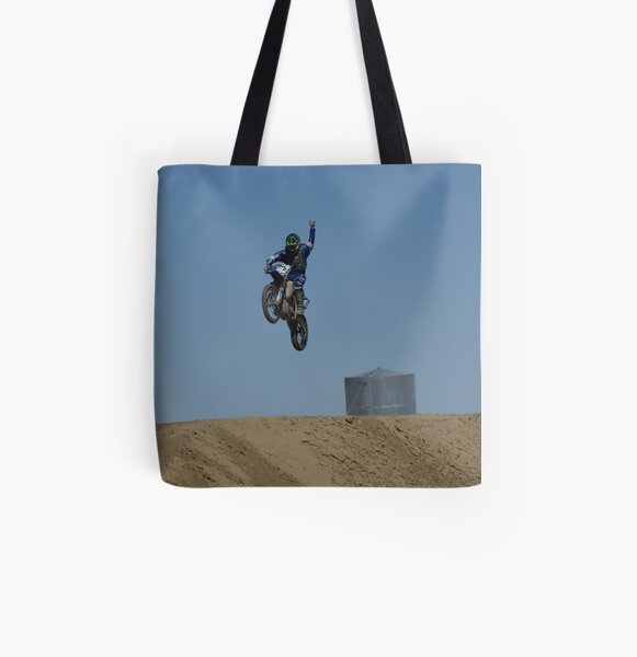 Motocross Victory celebrates his victory as he flys past the flag! USA All Over Print Tote Bag