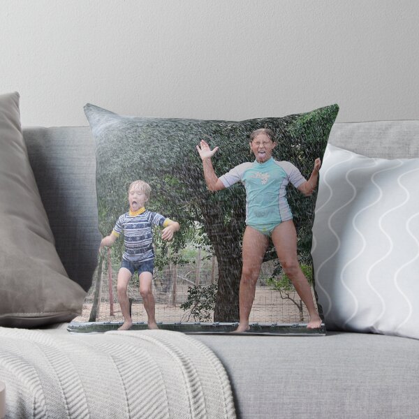 Under The Sprinkler Throw Pillow