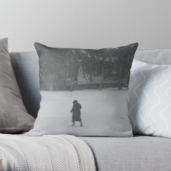 cross country skier Throw Pillow