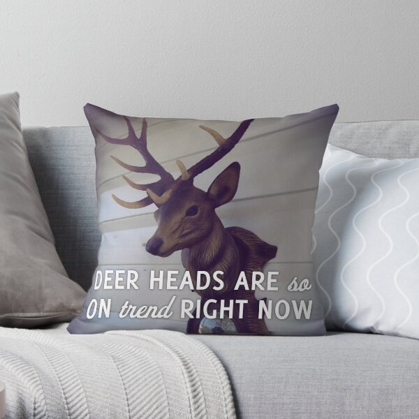 Deer heads are so on trend right now Throw Pillow