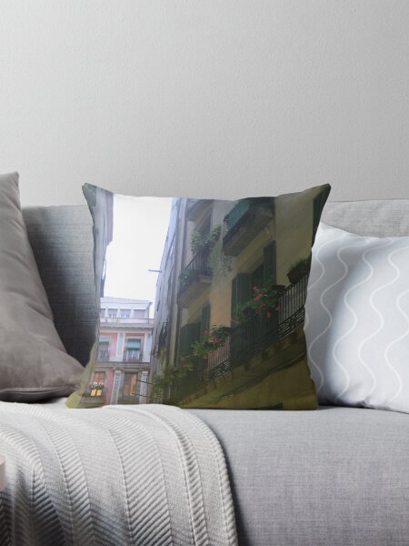 Barcelona - Ally with Modern buildings at the end Throw Pillow
