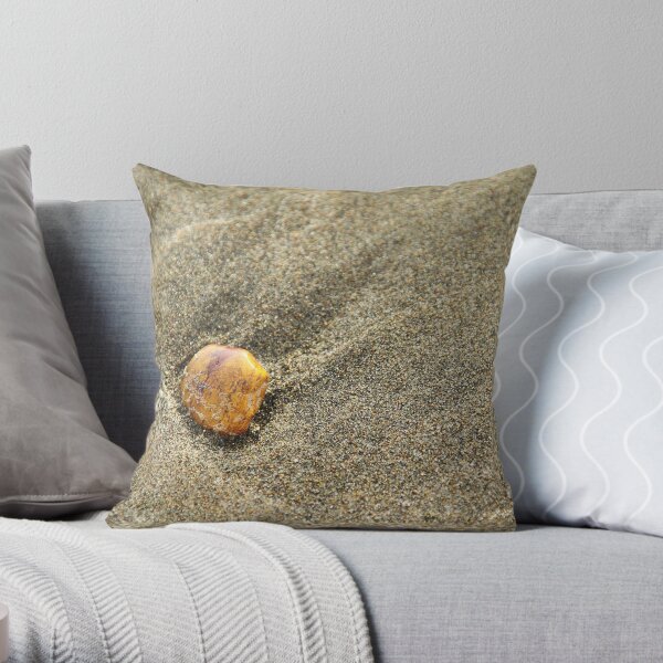Pebble on sand Throw Pillow