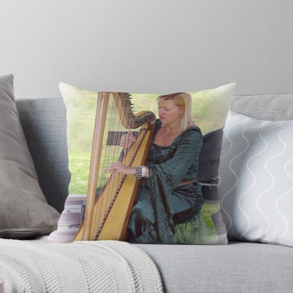 Item preview, Harpist designed and sold by Tony Cave.