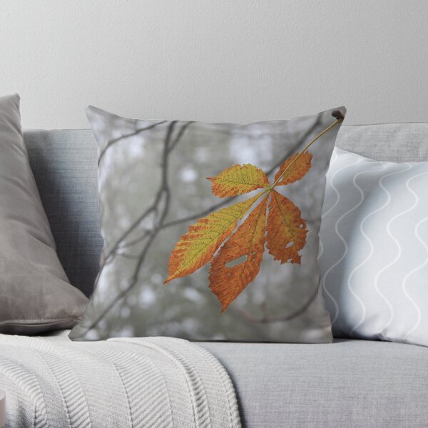 Solitary leaf Throw Pillow