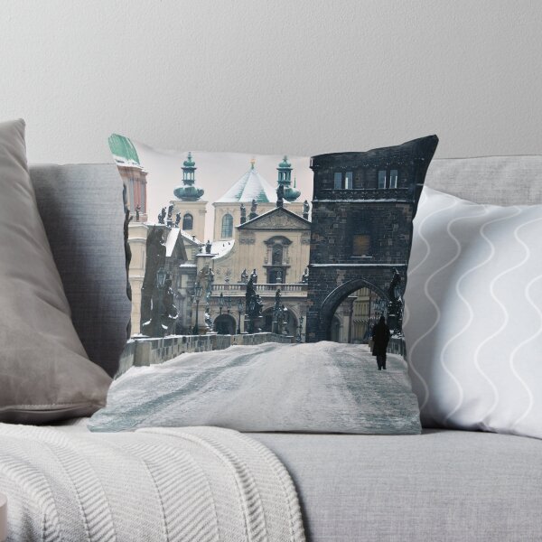 Snow on Prague's Charles Bridge with a hint of color Throw Pillow