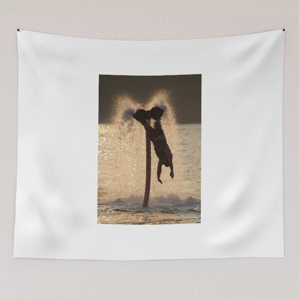 Item preview, Flyboarder stretches towards waves after back flip designed and sold by Nick Dale Photography.