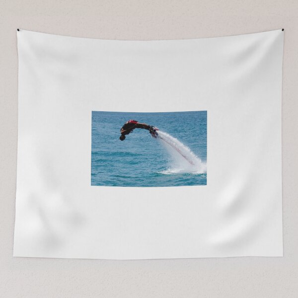 Item preview, Flyboarder in red followed by water jet designed and sold by Nick Dale Photography.