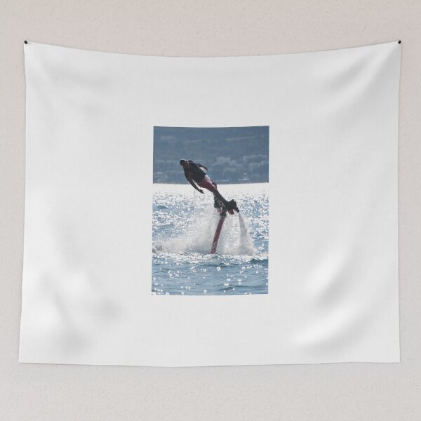 Item preview, Flyboarder leaning into turn over backlit waves designed and sold by Nick Dale Photography.
