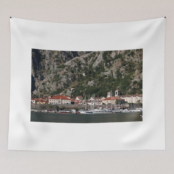 Item preview, Port with yachts and sailboats and old town Kotor cityscape Montenegro designed and sold by goceris.