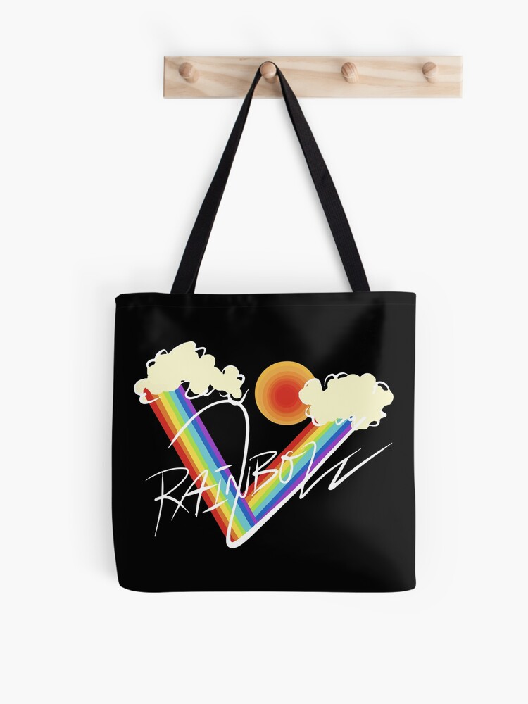 A Person Holding a Rainbow Tote Bag · Free Stock Photo