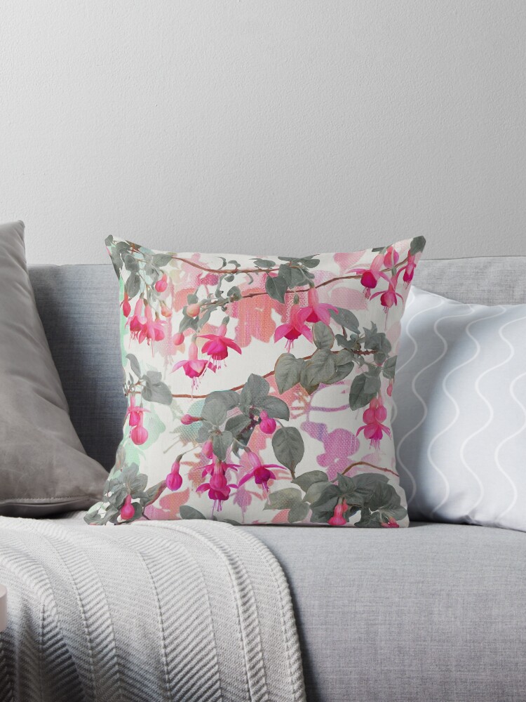 Pink and store gray throw pillows