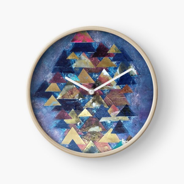Gold and mauve triangles on deep indigo background Clock
