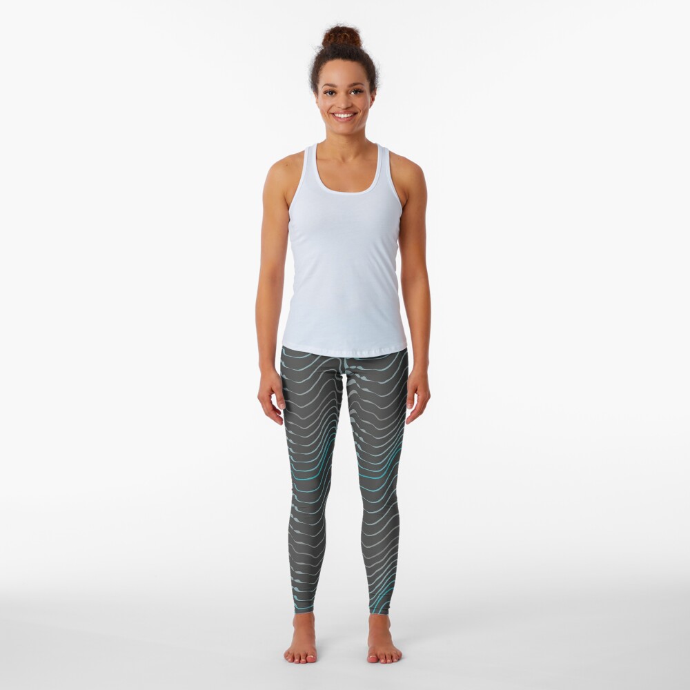 dynamic teal waves on anthracite shapelines Leggings