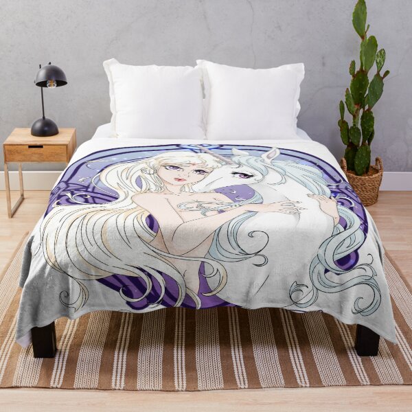 The two versions of the Unicorn Throw Blanket