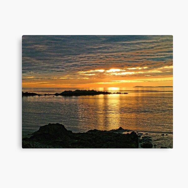 Sunset over Big Scone Rock and Islay from Machrihanish Canvas Print