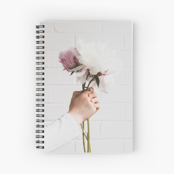 Child's hands holding beautiful peonies Spiral Notebook