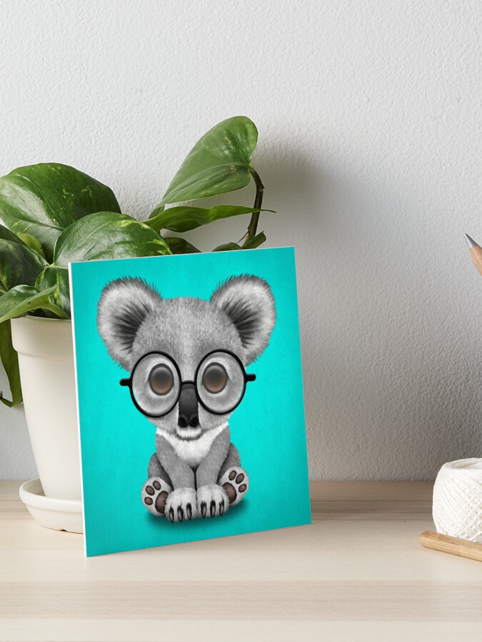 Cute koala girl in yellow eyeglasses Royalty Free Vector