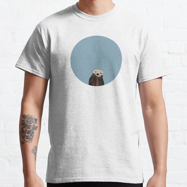 Netter Seeotter auf stahlblauem Festkörper. Minimalistisch. Küsten. Liebenswert Classic T-Shirt