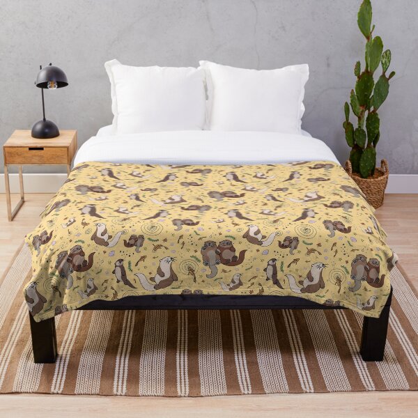 Otters in Yellow Throw Blanket