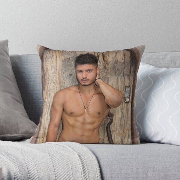 Naked muscular man covering crotch with shirt Throw Pillow