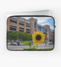 Sunflower in front of Darrell K Royal - Texas Memorial Stadium Laptop Sleeve