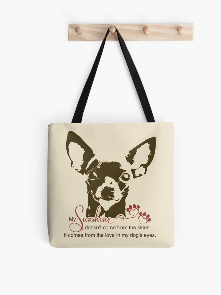 Chihuahua dog in pink woman handbag Royalty Free Vector