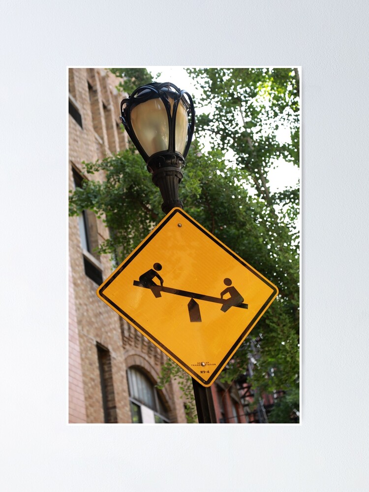 "Kids at play. See saw. Teeter totter. Street sign." Poster for Sale by