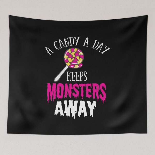 Item preview, Halloween Shirt Candy A Day Keeps The Monsters Away Gift Tee designed and sold by haselshirt.