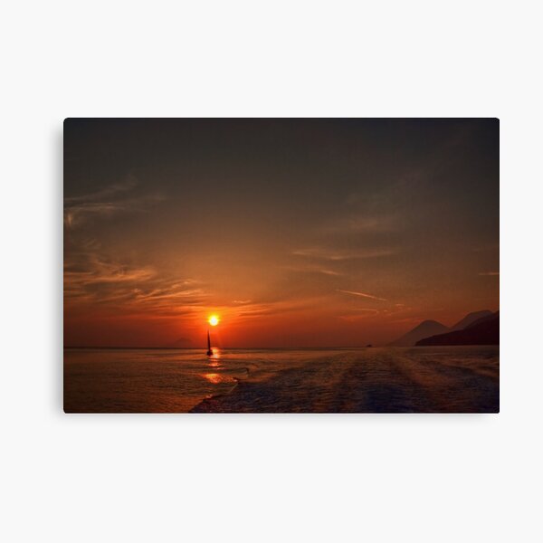 Sailing at sunset Canvas Print