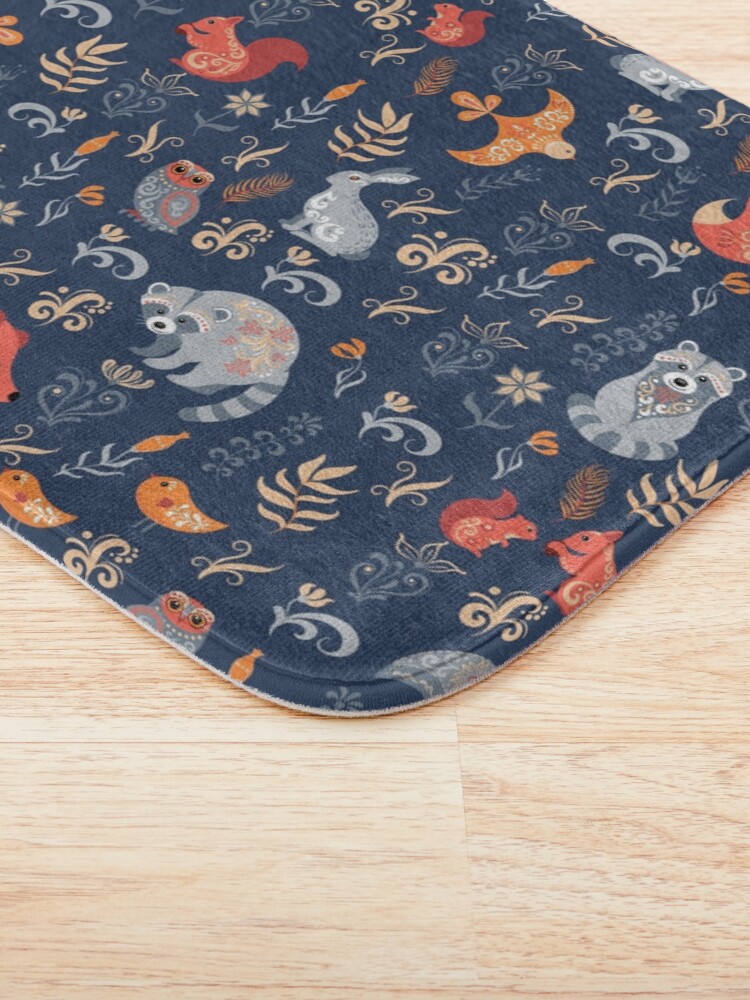 Alternate view of Fairy-tale forest. Fox, bear, raccoon, owls, rabbits, flowers and herbs on a blue background. Bath Mat