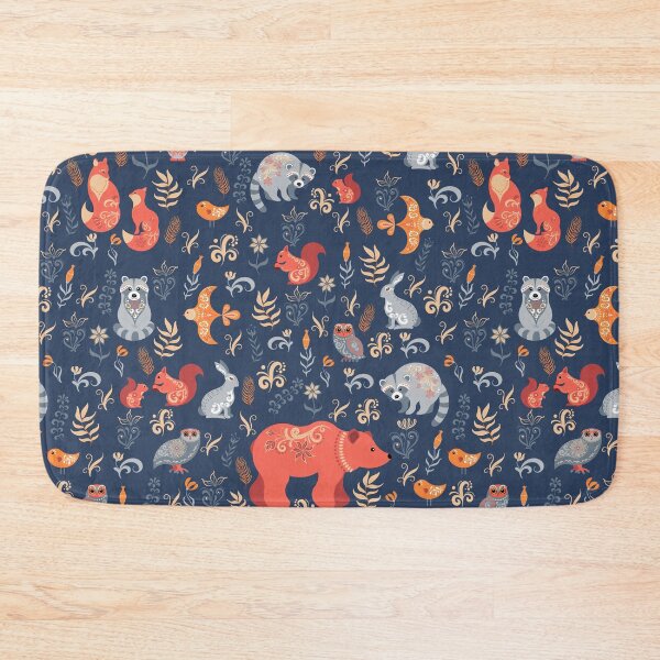 Fairy-tale forest. Fox, bear, raccoon, owls, rabbits, flowers and herbs on a blue background. Bath Mat