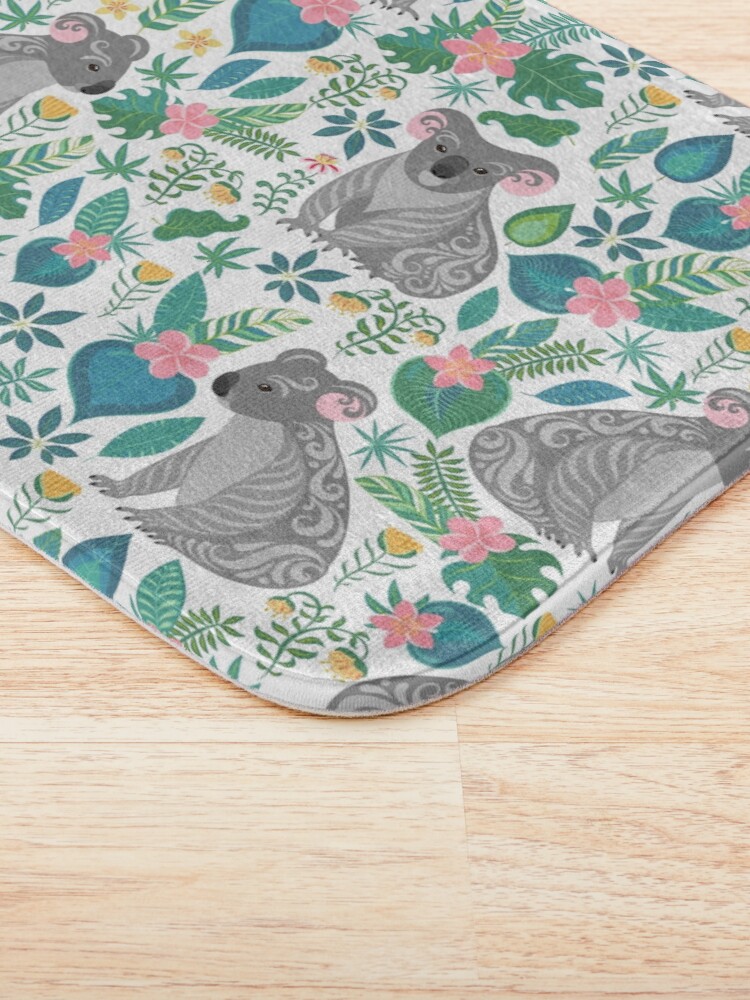 "Cute gray koalas with ornaments, tropical flowers and leaves. Seamless