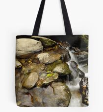 still water flows. Tote Bag