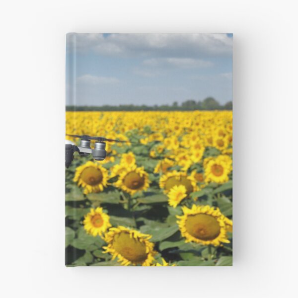 Item preview, The drone is flying over the sunflower field in summer designed and sold by goceris.