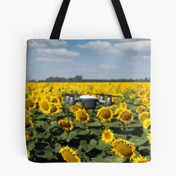 Item preview, The drone is flying over the sunflower field in summer designed and sold by goceris.