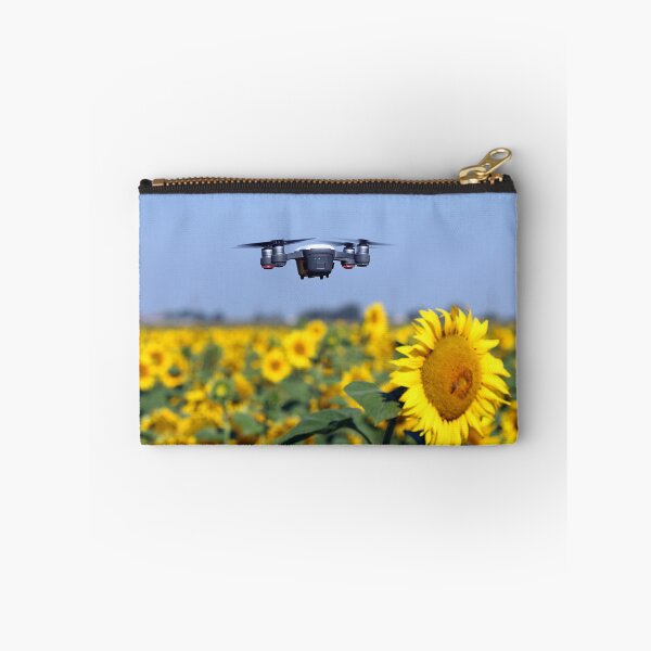 Item preview, The drone is flying over the sunflower field technology and agriculture designed and sold by goceris.
