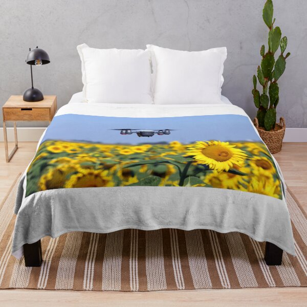 Item preview, The drone is flying over the sunflower field technology and agriculture designed and sold by goceris.