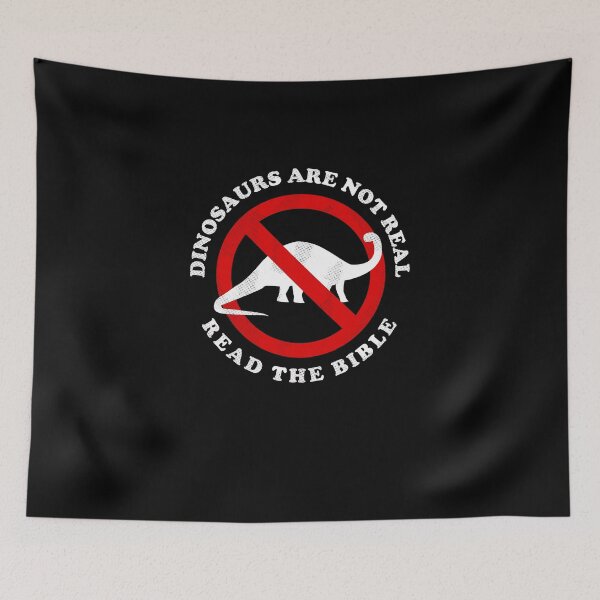 Item preview, Dinosaurs Are Not Real Read The Bible designed and sold by Yipptee Shirts.