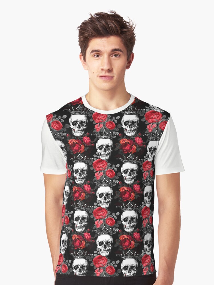 Skulls crowns and faded red roses on a dark black wrapping paper