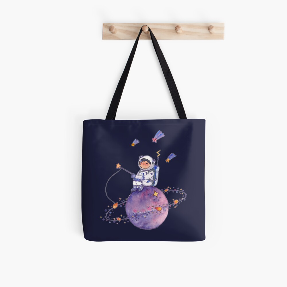 Astronaut catching Asteroids on a Star Tote Bag
