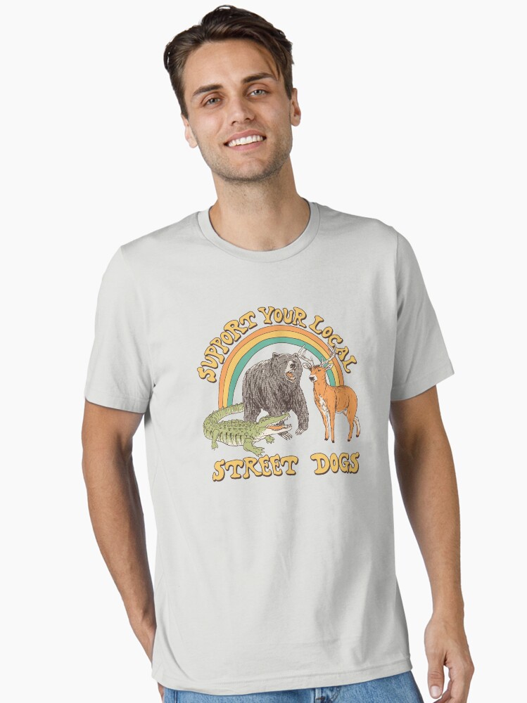 Imagen 1 de 7, Camiseta esencial con la obra Perros callejeros, diseñada y vendida por wytrab8.