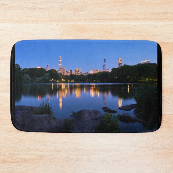 Item preview, Central Park Lake with view of Manhattan skyline at night designed and sold by quietbits.